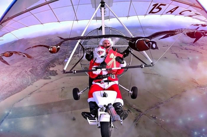 Santa fly wiht geese